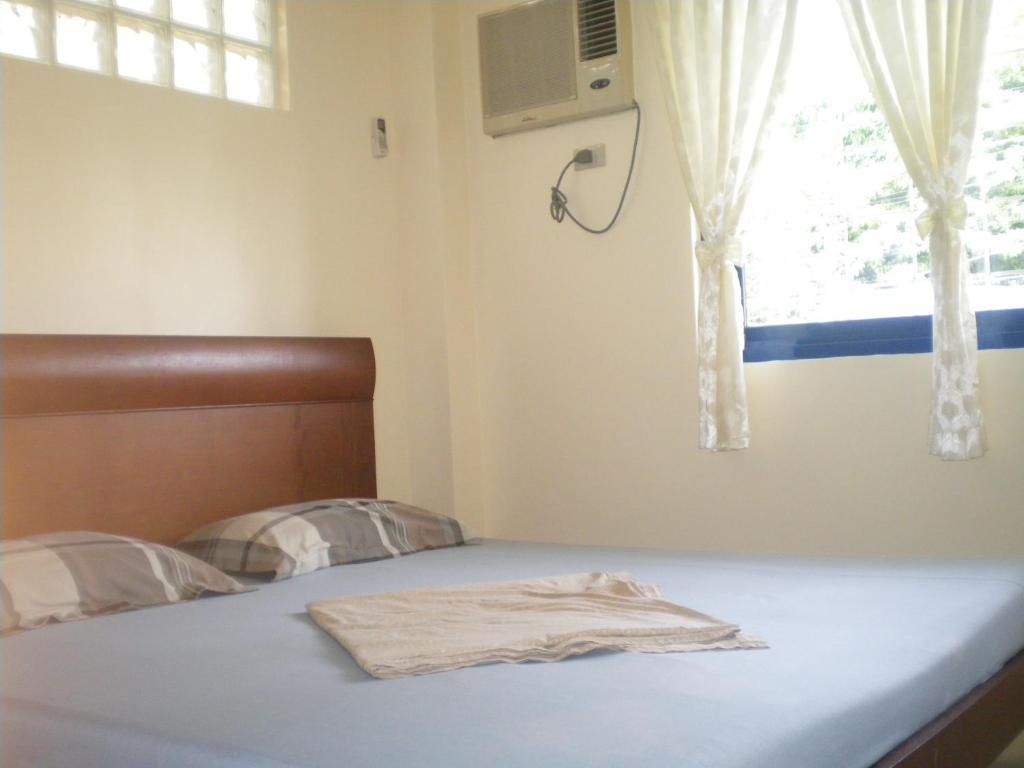 Dumaguete Springs Apartment Dumaguete City Rum bild